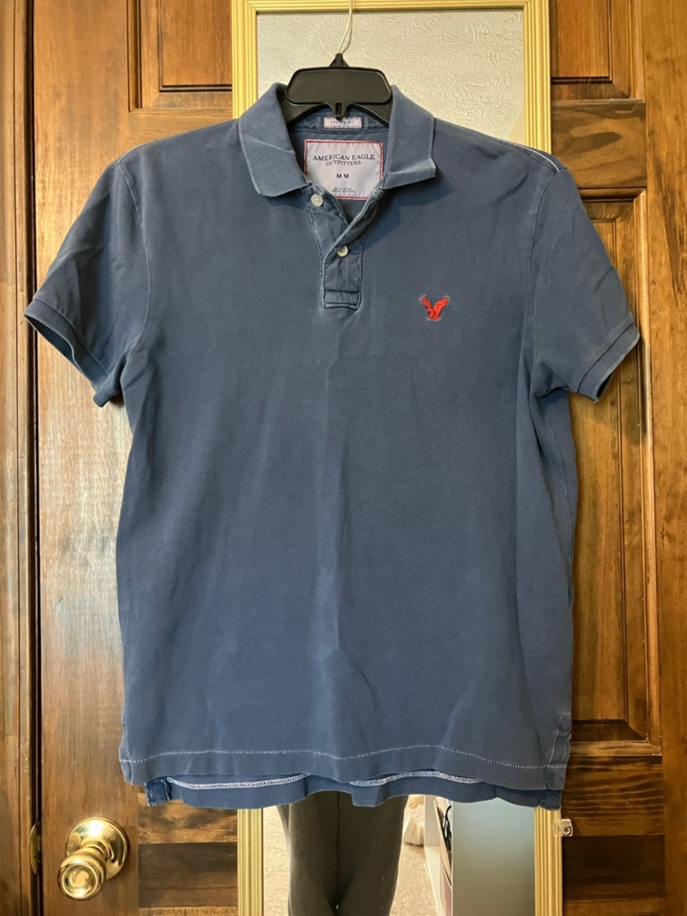 American Eagle Outfitters Men's Blue Polo with Red Eagle Logo